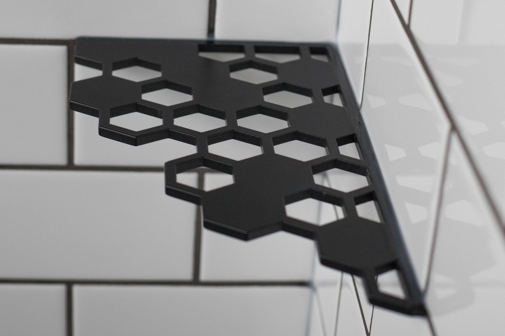 Corner shelf in black HIVE Shelf matte black by Heliotile